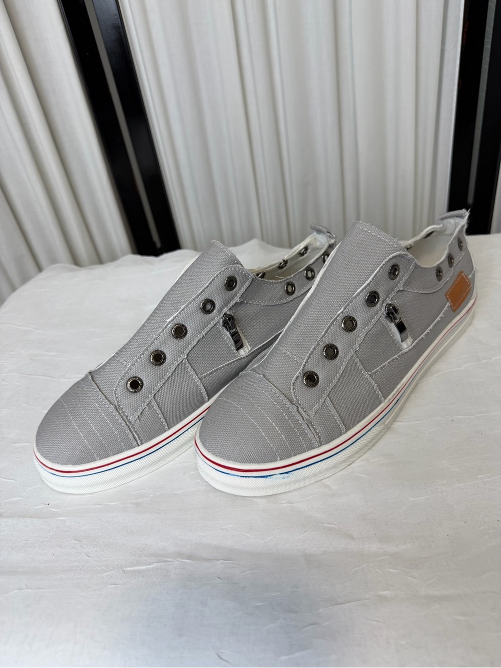 Gray Slip-On Lost Ink Canvas Sneakers with Red & Blue Stripe Sole